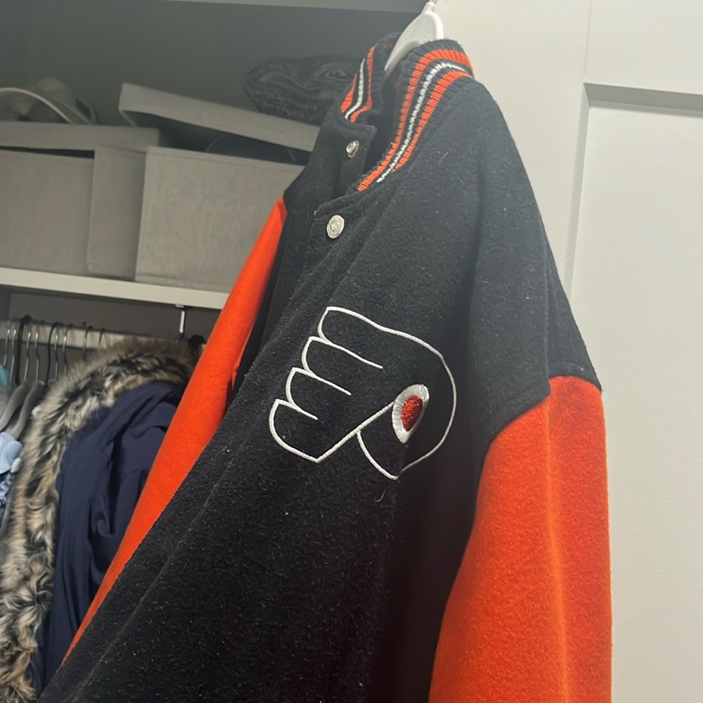 Flyers letterman jacket. Barely worn. The size is a medium/large.